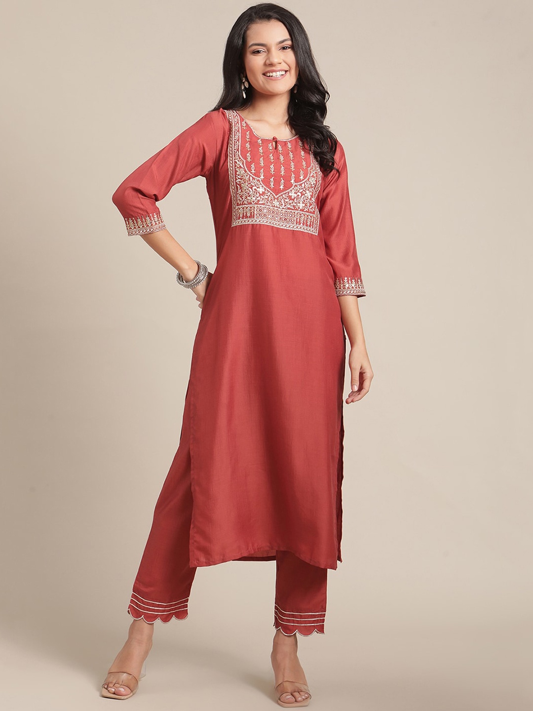 

Varanga Women Rust Yoke Design Thread Work Kurta with Trousers