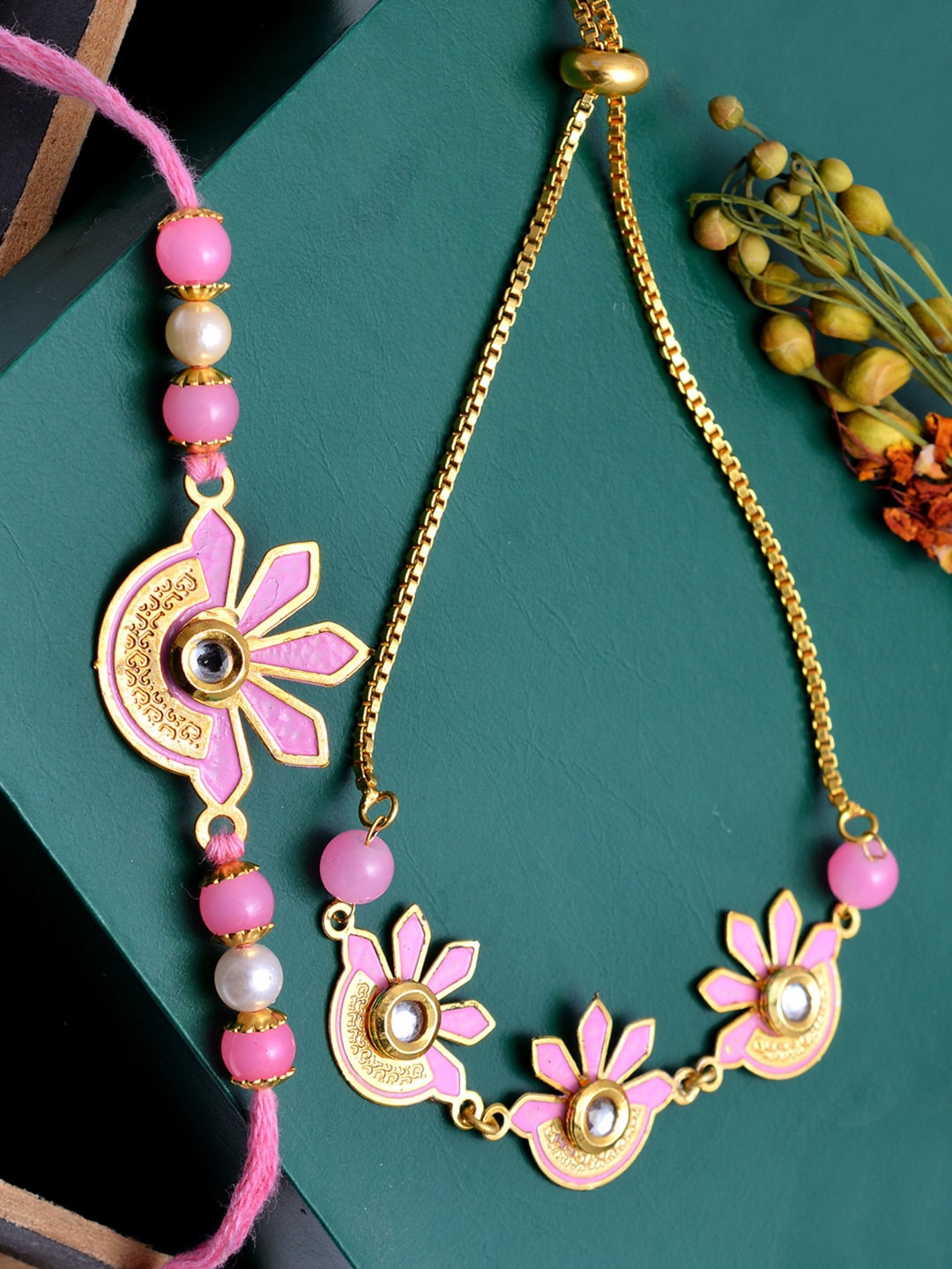 

PANASH Gold-Plated & Pink Brass Handcrafted Rakhi & Lumba Bracelet With Roli Chawal