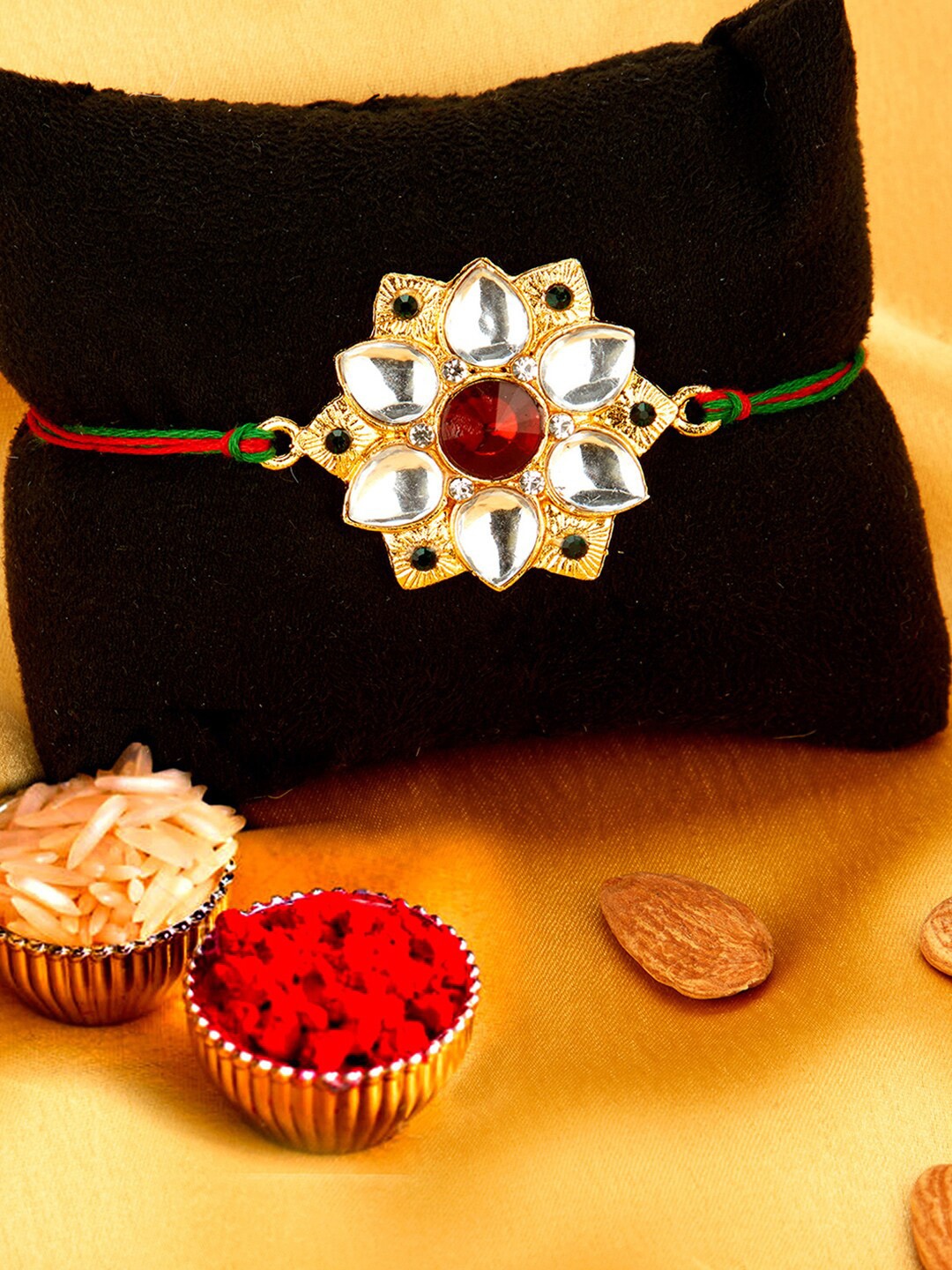 

Sukkhi Rakhi Men Gold-Plated Red & White Stone-Studded & Beaded Rakhi With Greeting Card, Roli & Chawal