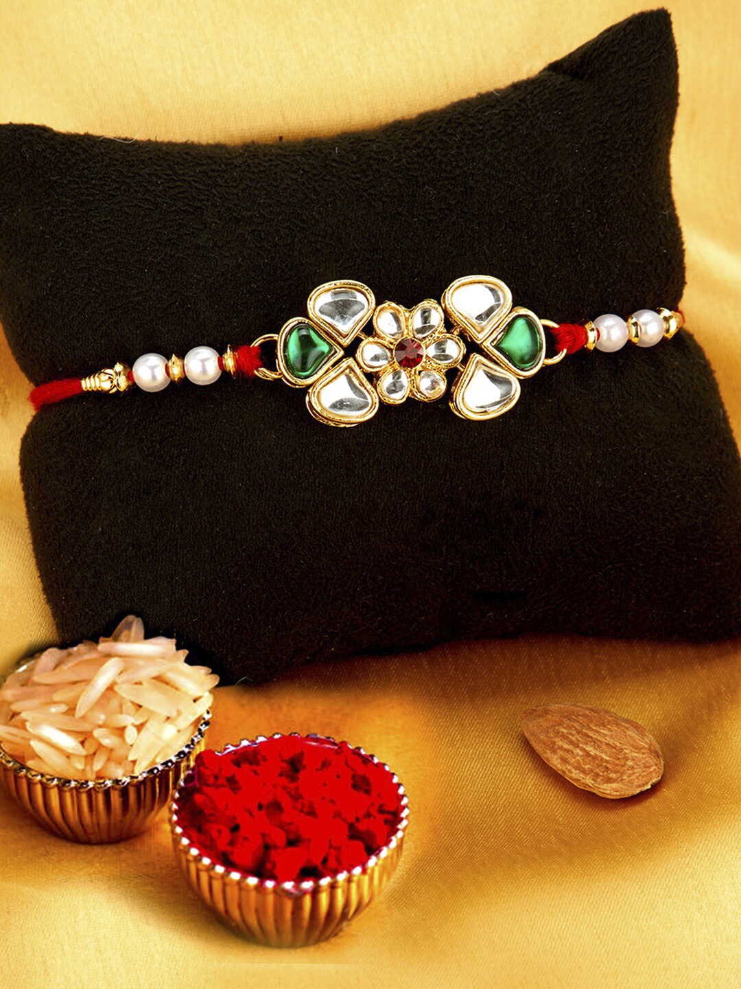 

Sukkhi Rakhi Men Gold-Plated White & Green Stone-Studded & White Beaded Rakhi With Roli Chawal & Greeting Card