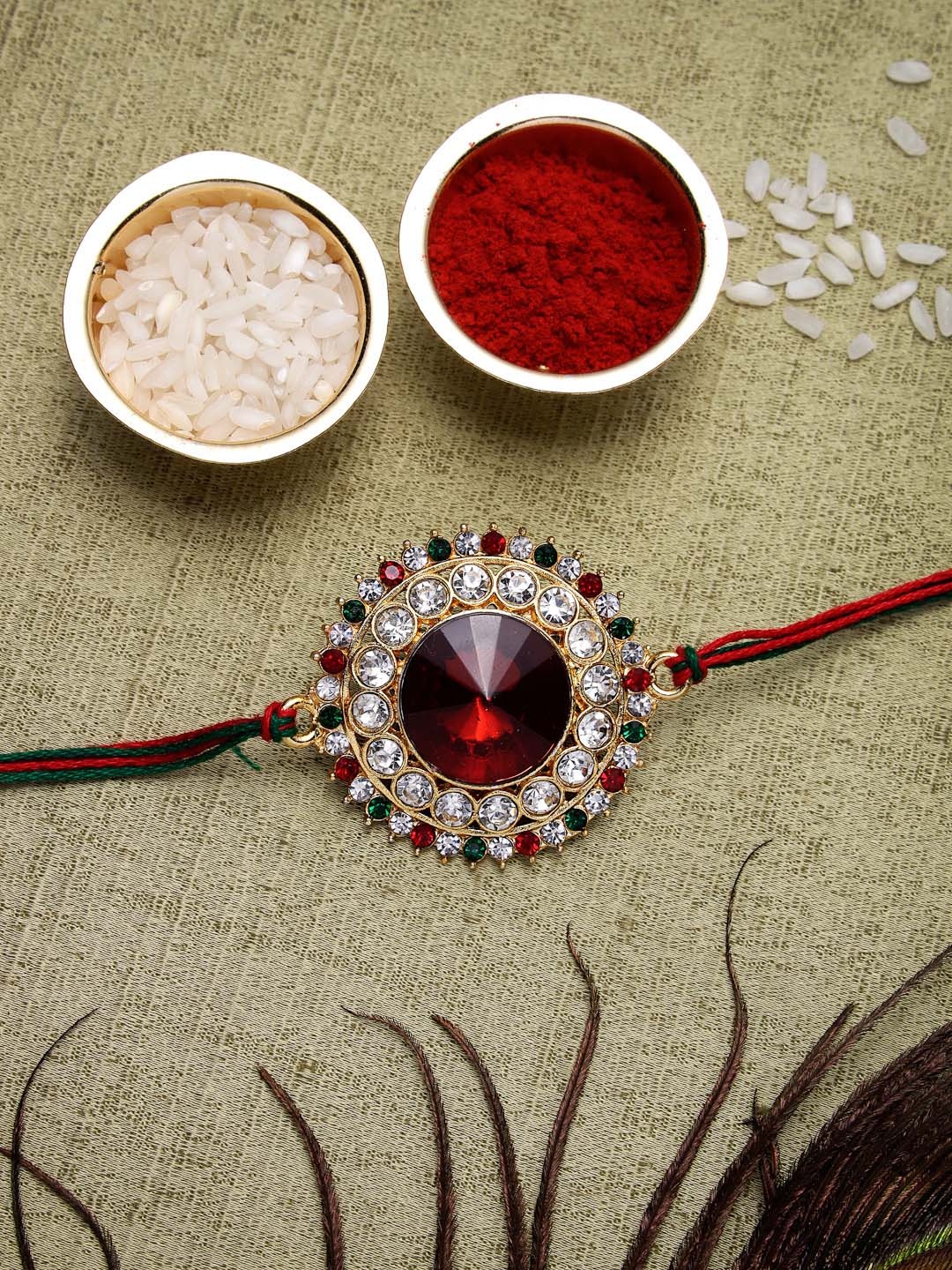 

Sukkhi Rakhi Unisex Red & White Stone-Studded Rakhi With Roli Chawal & Greeting Card, Gold