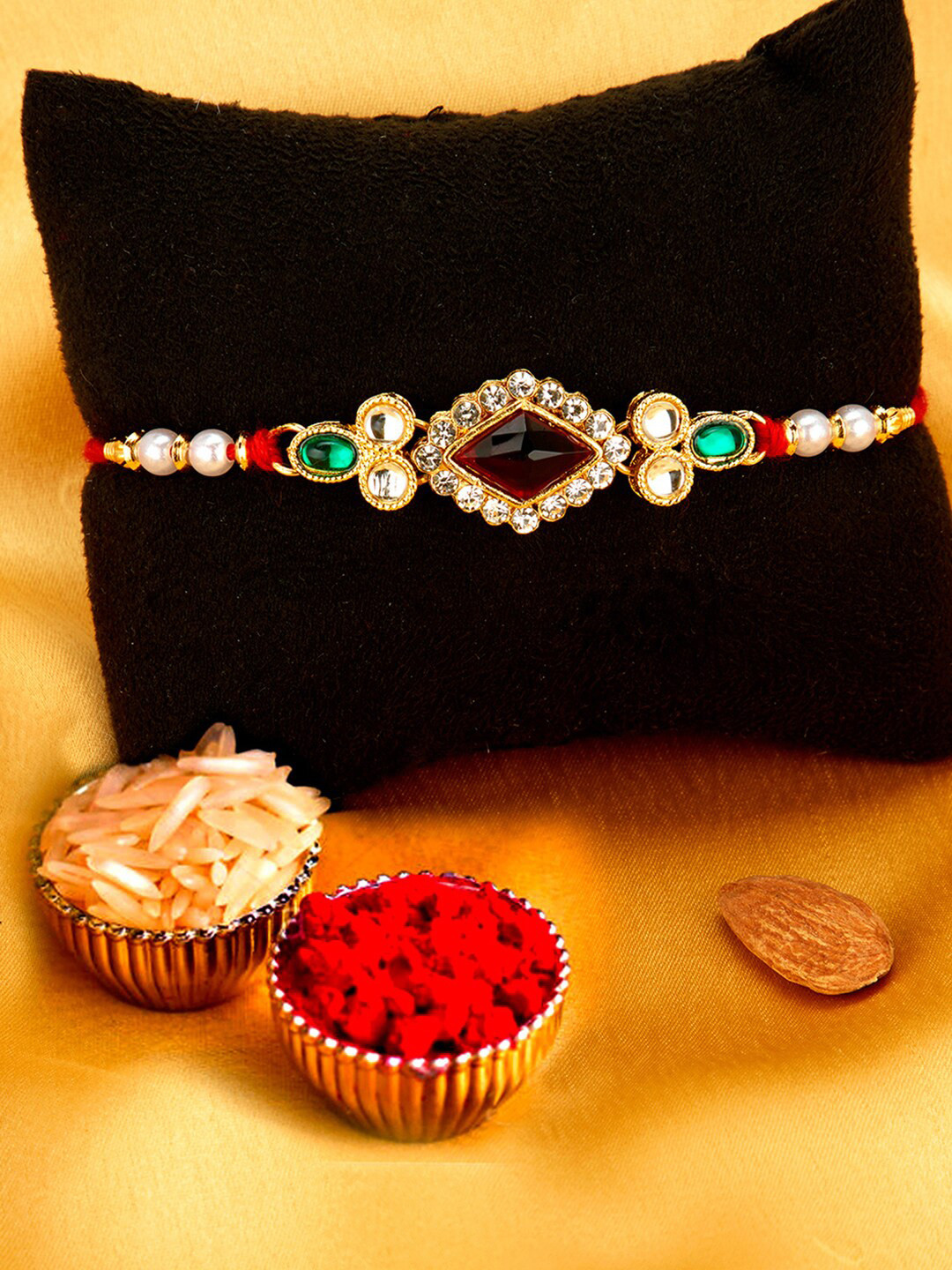 

Sukkhi Rakhi Men Gold-Plated White & Red Stone-Studded Beaded Rakhi With Roli Chawal & Greeting Card