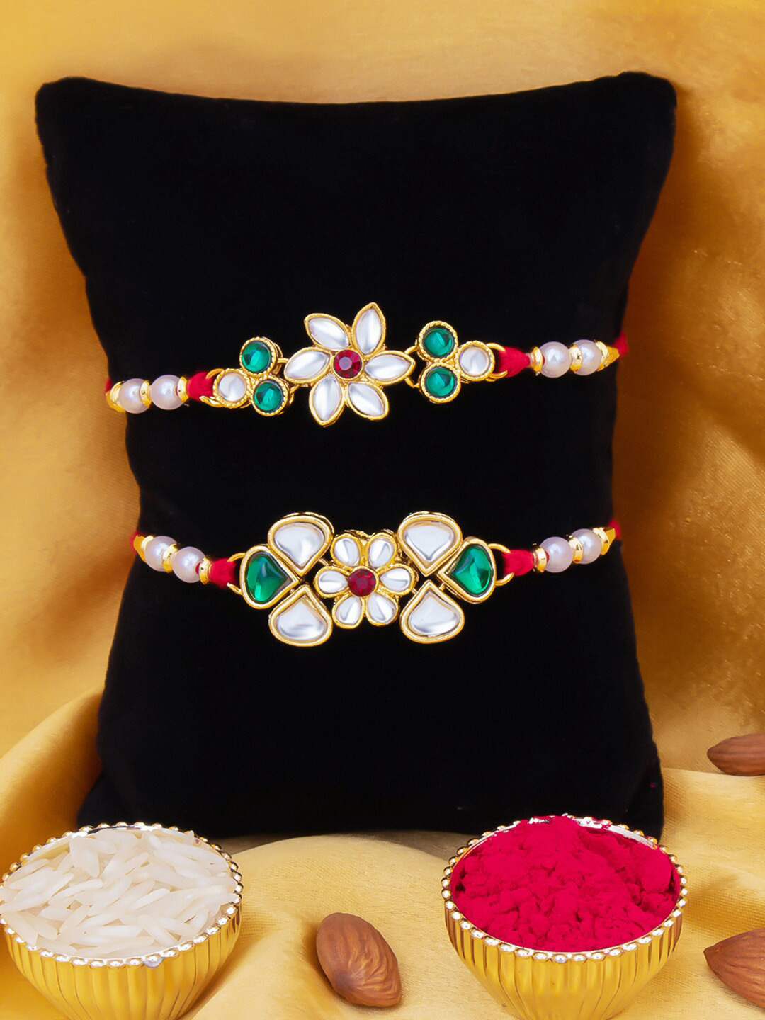 

Sukkhi Rakhi Men Set Of 2 Gold-Plated White & Green Stone-Studded Beaded Rakhi With Roli Chawal & Greeting Card