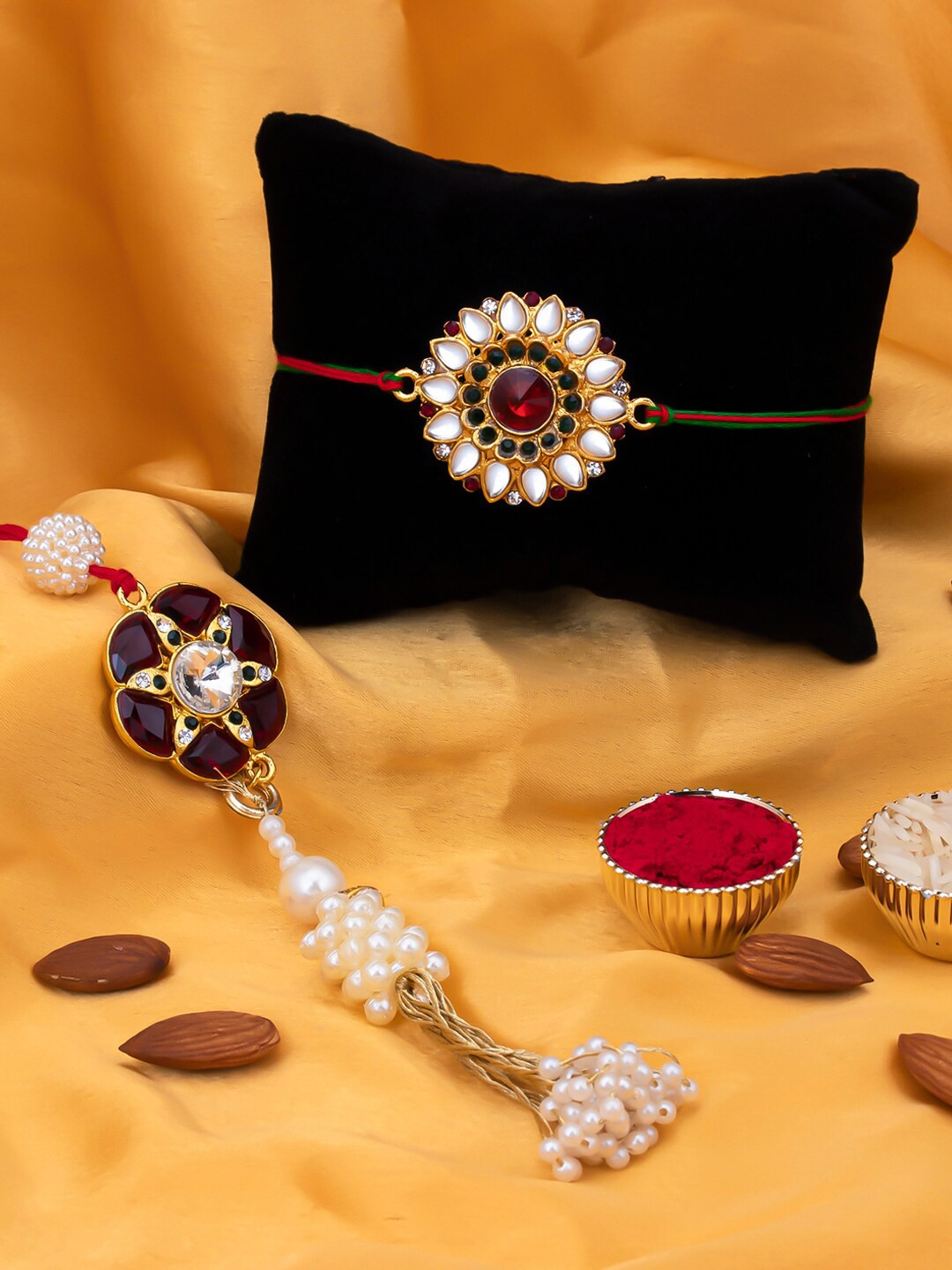 

Sukkhi Rakhi Men Gold-Plated Red & White Stone-Studded & Beaded Rakhi Lumba Set With Greeting Card & Roli Chawal