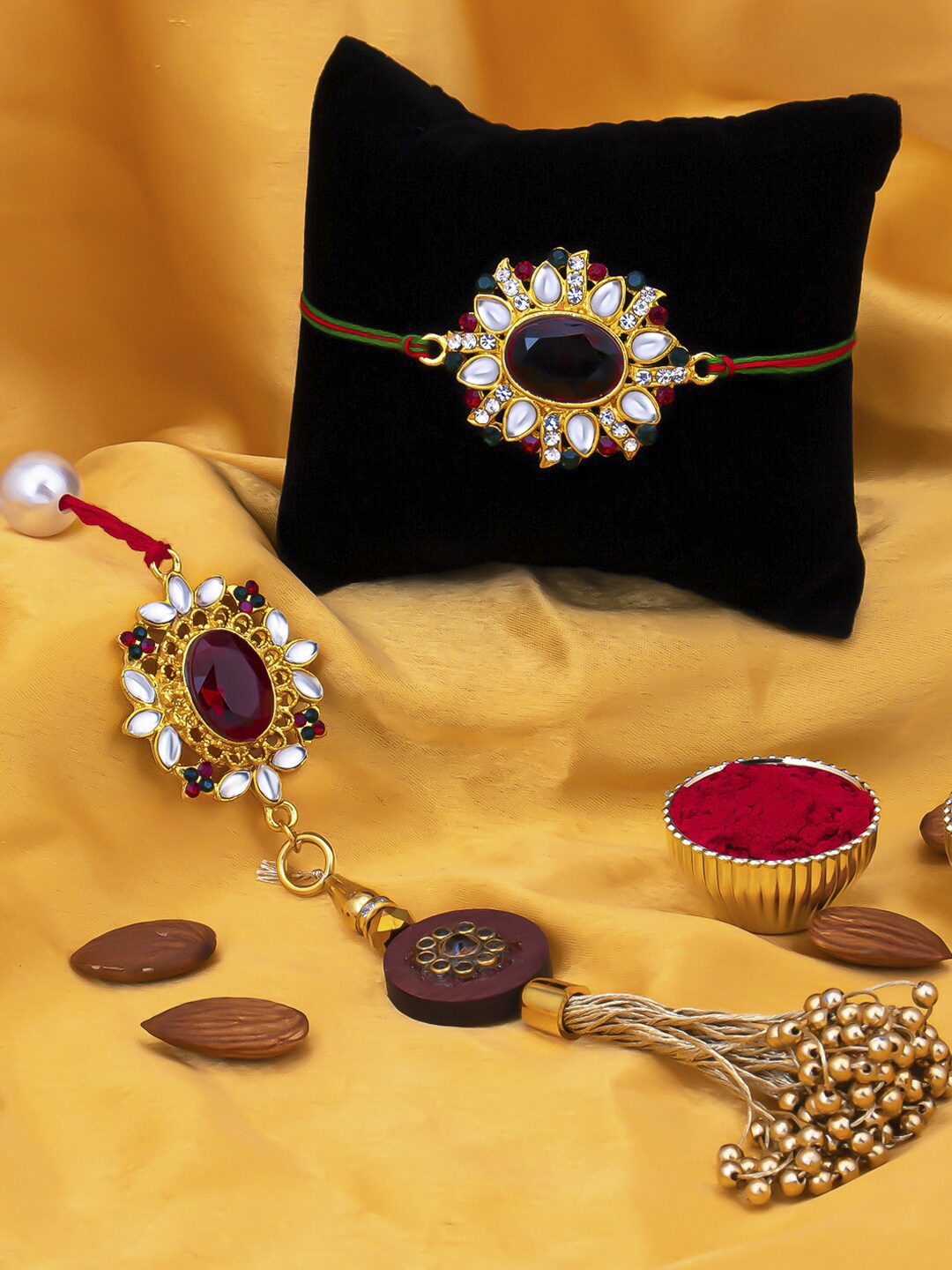 

Sukkhi Rakhi Gold-Plated Red Stone-Studded & Beaded Rakhi With Roli Chawal & Greeting Card
