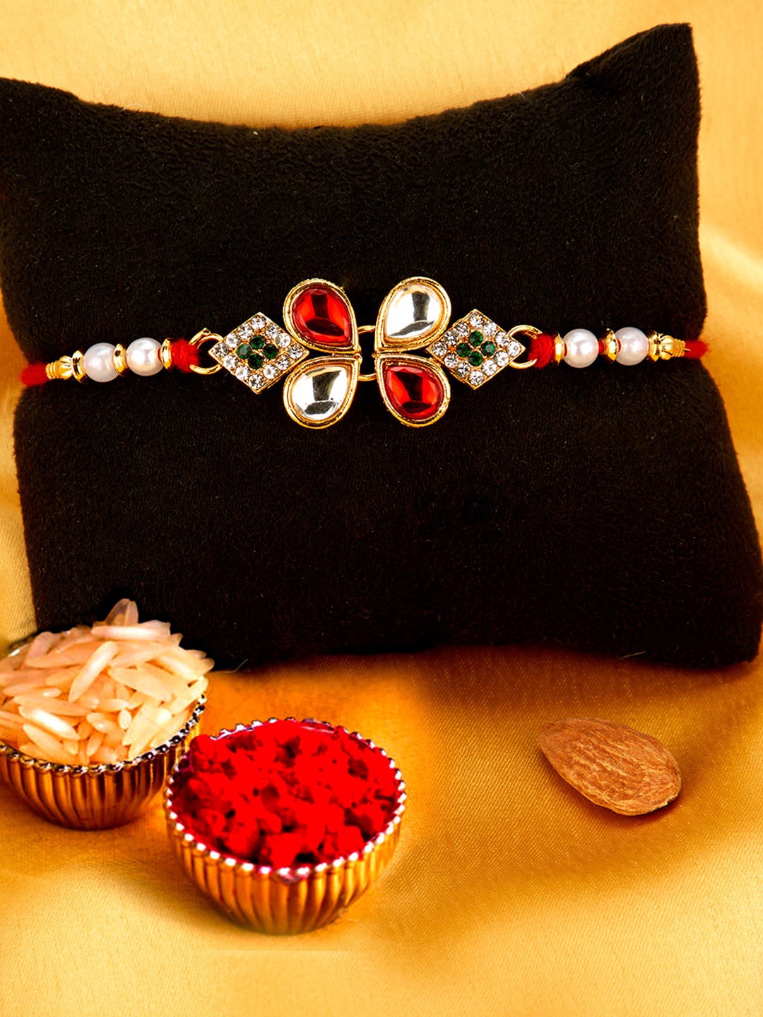 

Sukkhi Rakhi Men Gold-Plated White & Red Stone-Studded & Beaded Rakhi With Roli Chawal & Raksha Bandhan Greeting Card