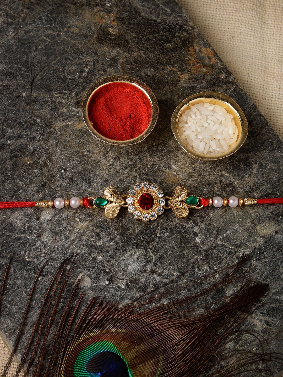 

Sukkhi Rakhi Men Gold-Plated White & Red Stone-Studded & White Beaded Rakhi With Roli Chawal & Greeting Card