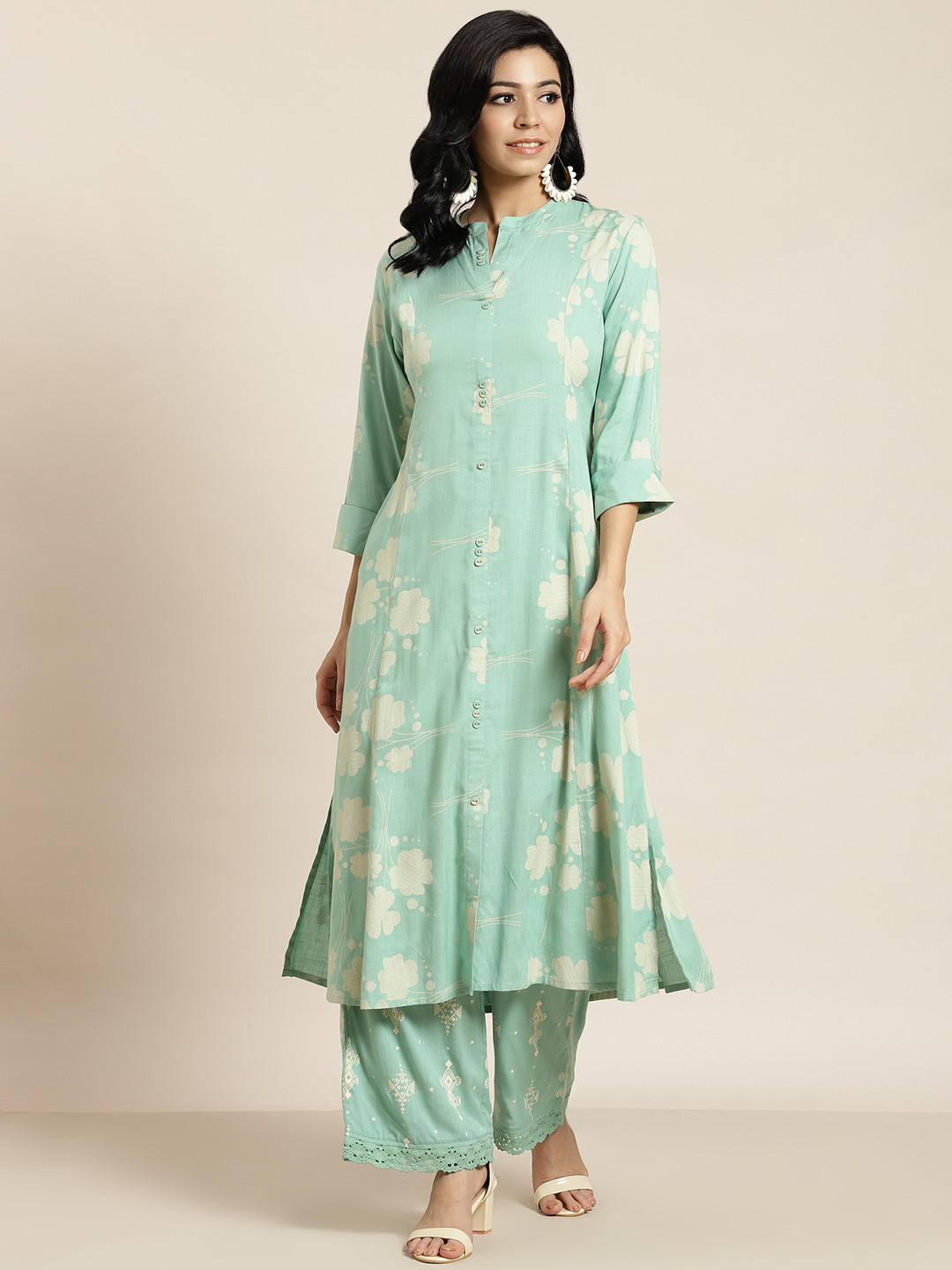 

Juniper Women Sea Green Floral Printed Panelled Liva Kurta with Palazzos