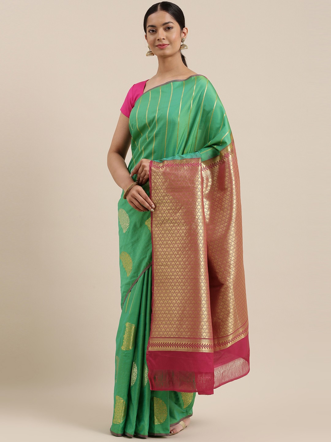 

The Chennai Silks Classicate Green & Golden Woven Design Zari Art Silk Saree