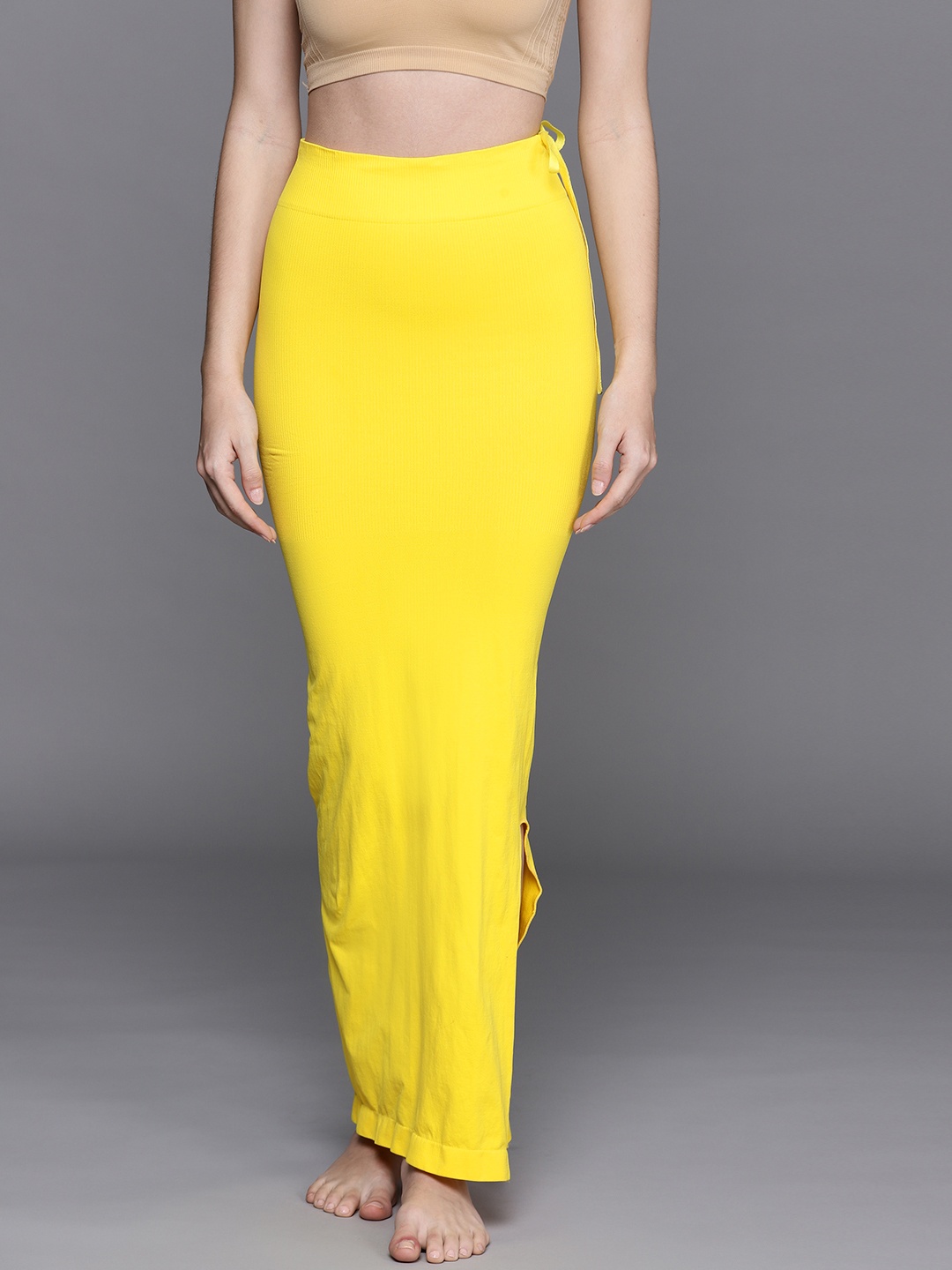

Inddus Women Yellow Solid High Compressed Seamless Saree Shapewear with Drawstring