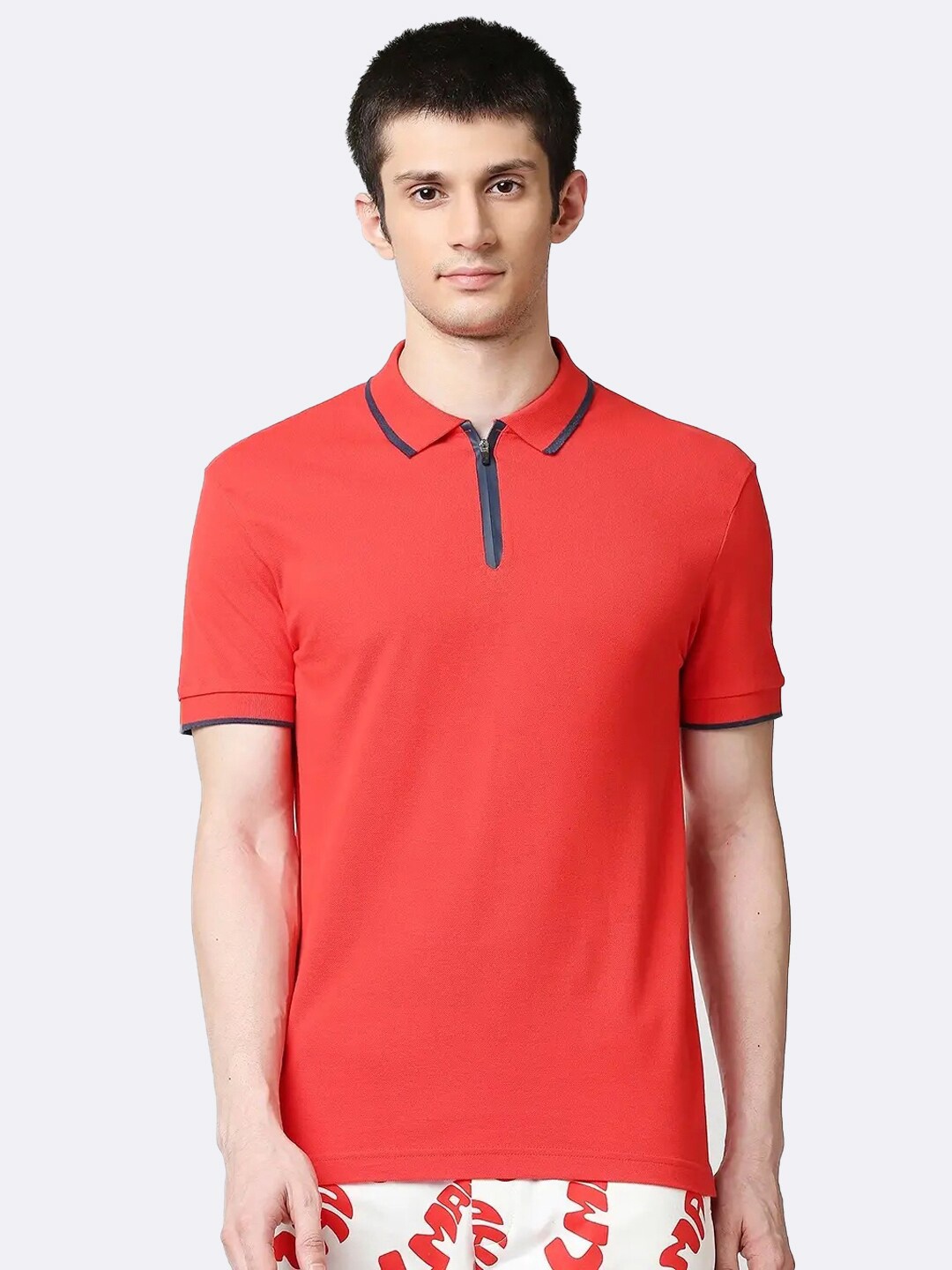 

Bewakoof Men Red Solid Polo Collar T-shirt