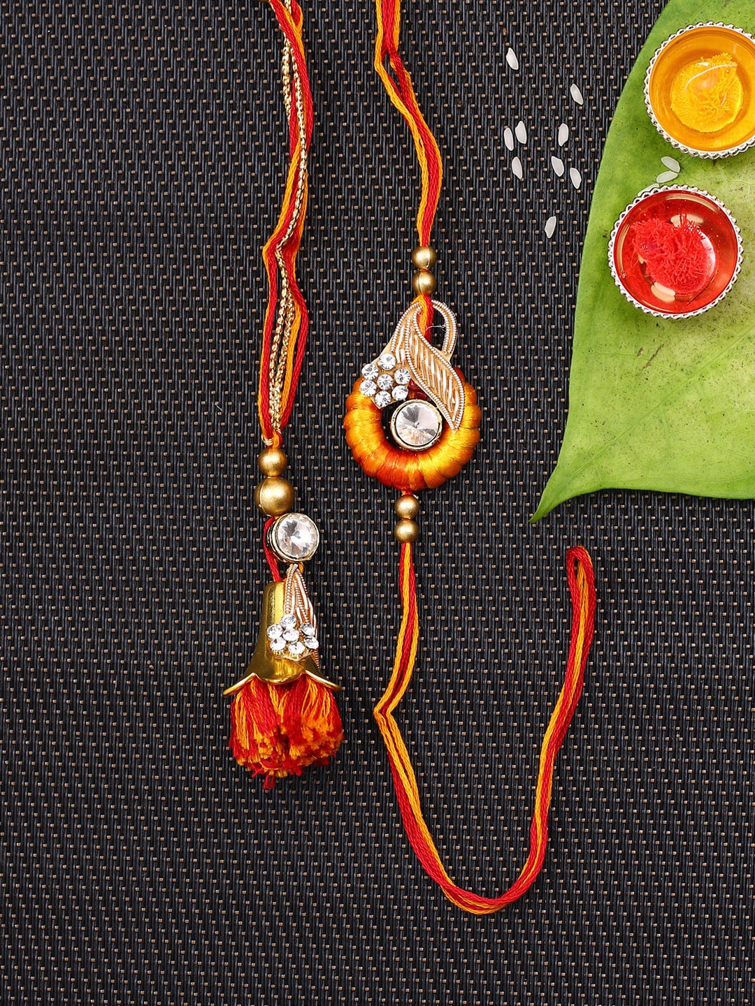 

Aapno Rajasthan Red & Orange Stone-Studded Handcrafted Bhaiya Bhabhi Rakhi Set