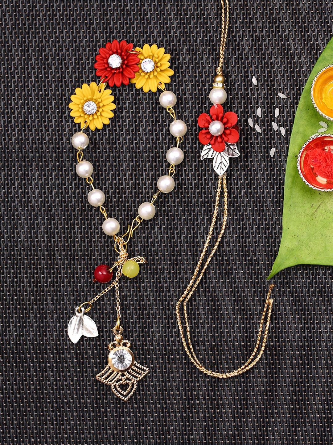 

Aapno Rajasthan Set Of 2 Flower Design Bhaiya Rakhi & Bhabhi Bracelete Rakhi, Red