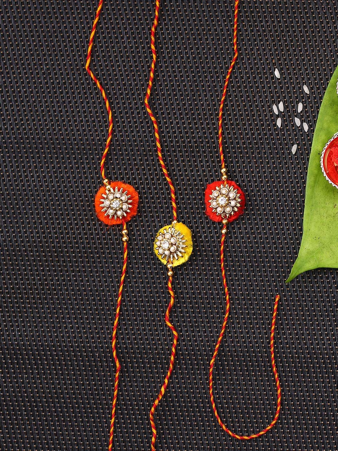 

Aapno Rajasthan Yellow & Orange Set Of 3 Traditional Handcrefted Bhaiya Rakhi