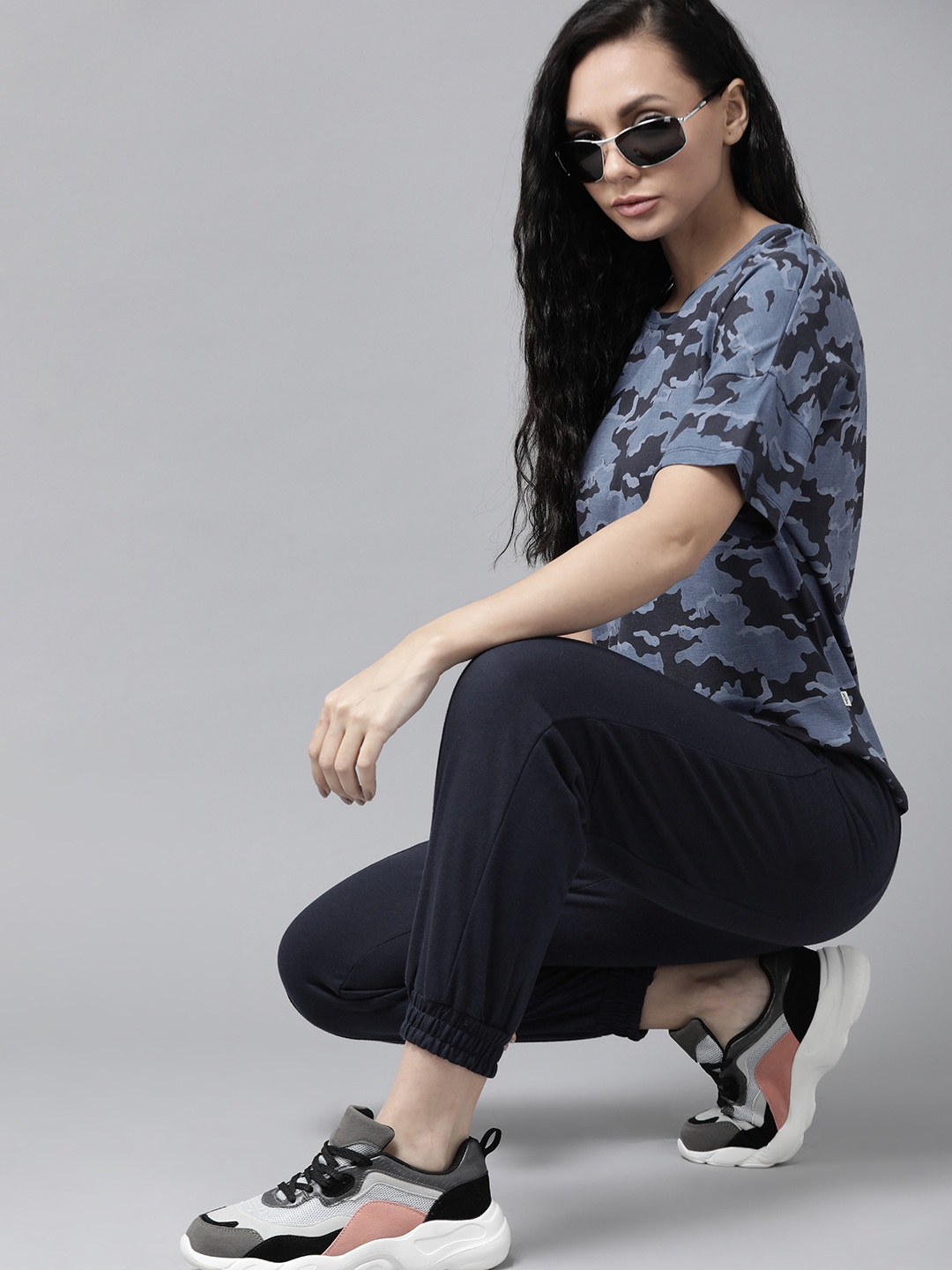 

Roadster Women Blue Camouflage Print T-shirt with Solid Trousers, Navy blue