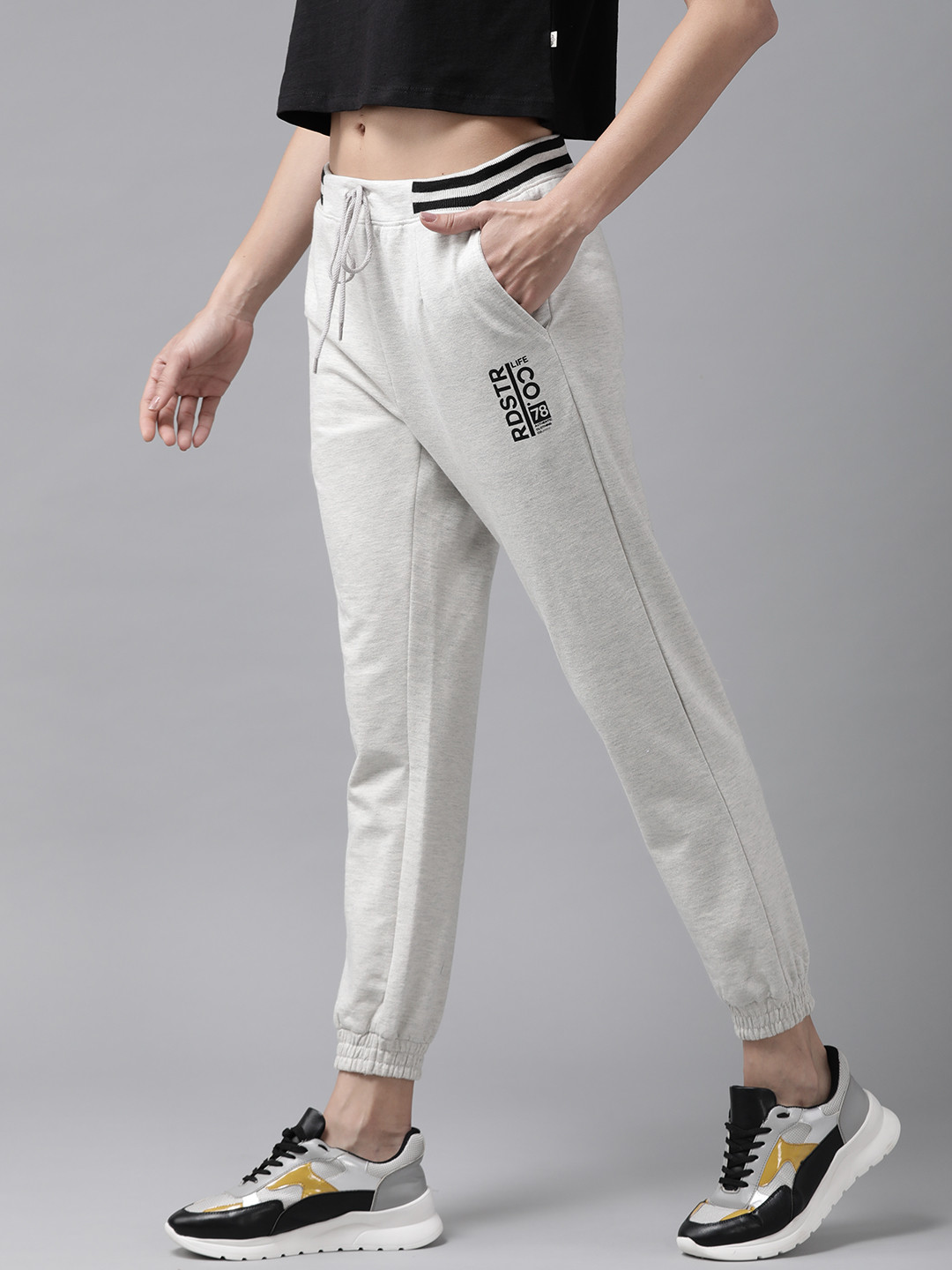 

Roadster Women Off-White Brand Logo Printed Joggers