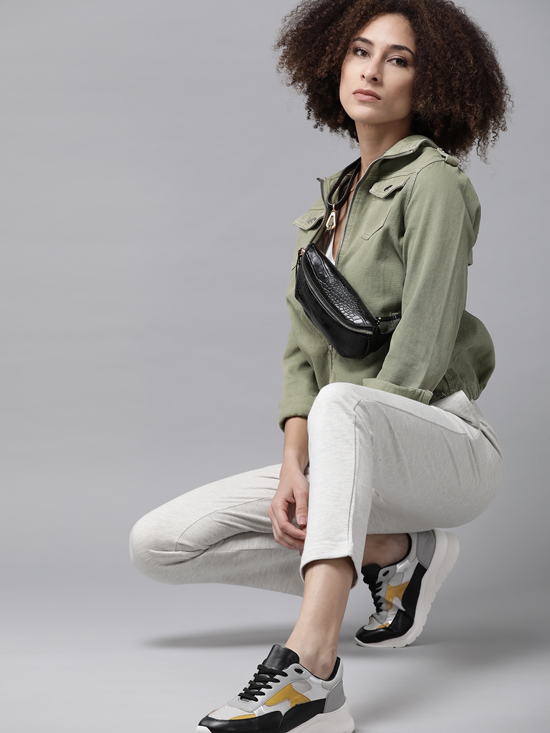 

Roadster Women Off-White Solid Regular Track Pants