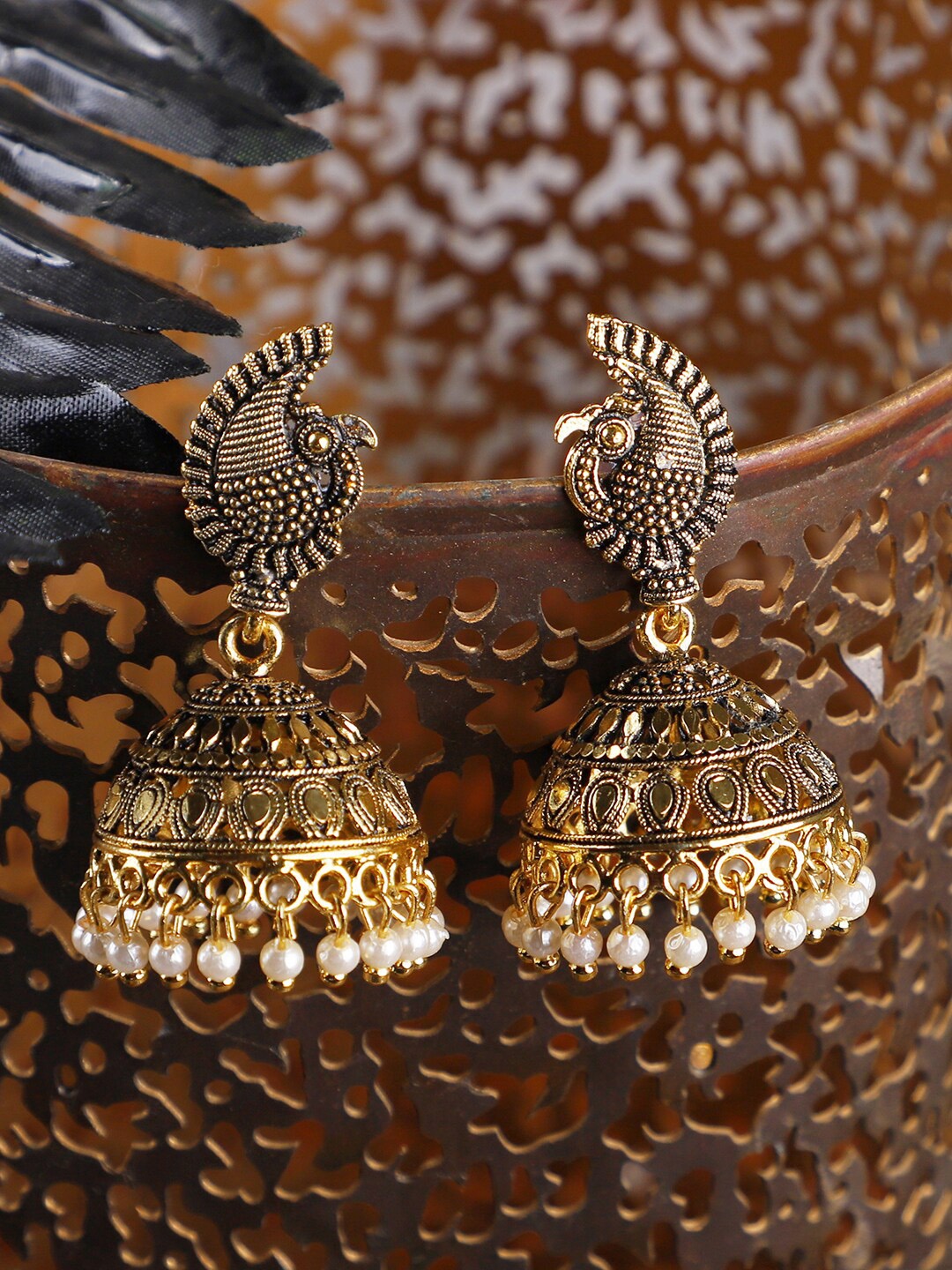 

ANIKAS CREATION Gold-Toned Contemporary Pearl Studded Antique Jhumkas Earrings