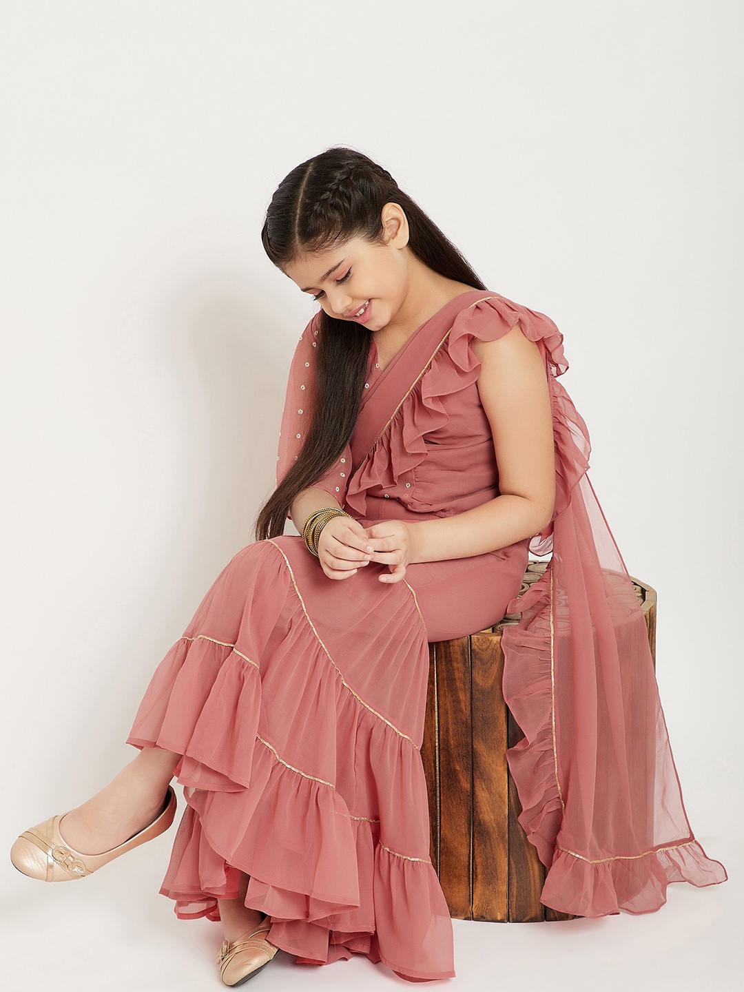 

Stylo Bug Girls Peach-Coloured Printed Layered Top with Sharara & Attached Dupatta