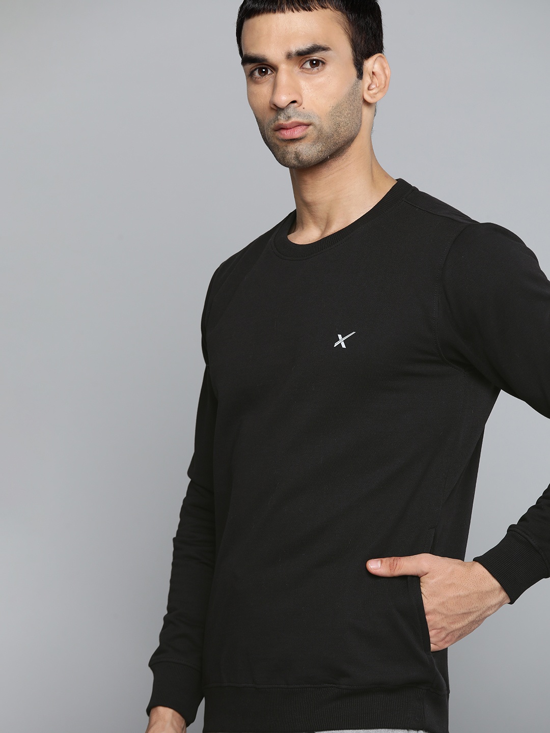 

HRX by Hrithik Roshan Men Black Solid Training Sweatshirt