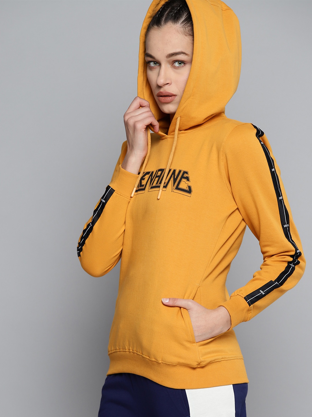 

HRX By Hrithik Roshan Women Mustard Rapid-Dry Solid Lifestyle Sweatshirt