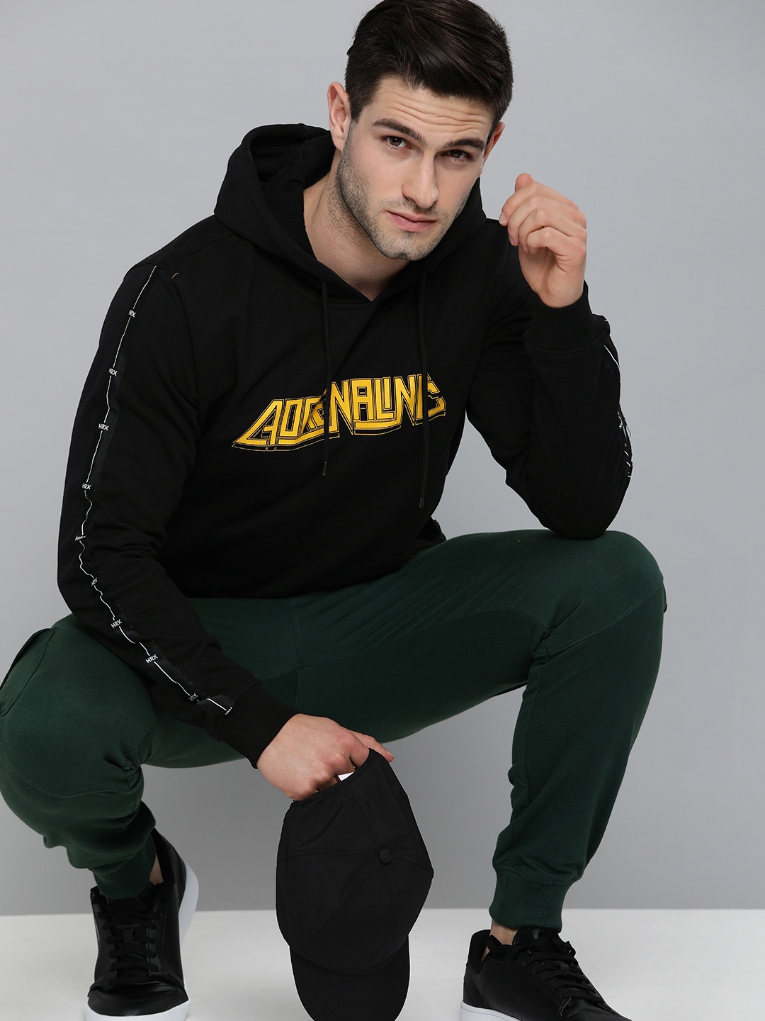 

HRX by Hrithik Roshan Lifestyle Men Black & Mustard Yellow Rapid-Dry Typography Sweatshirt