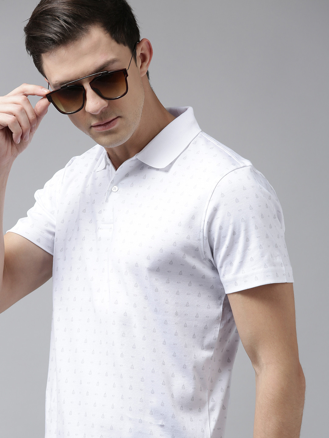

Arrow New York Men White Printed Polo Collar Cotton T-shirt
