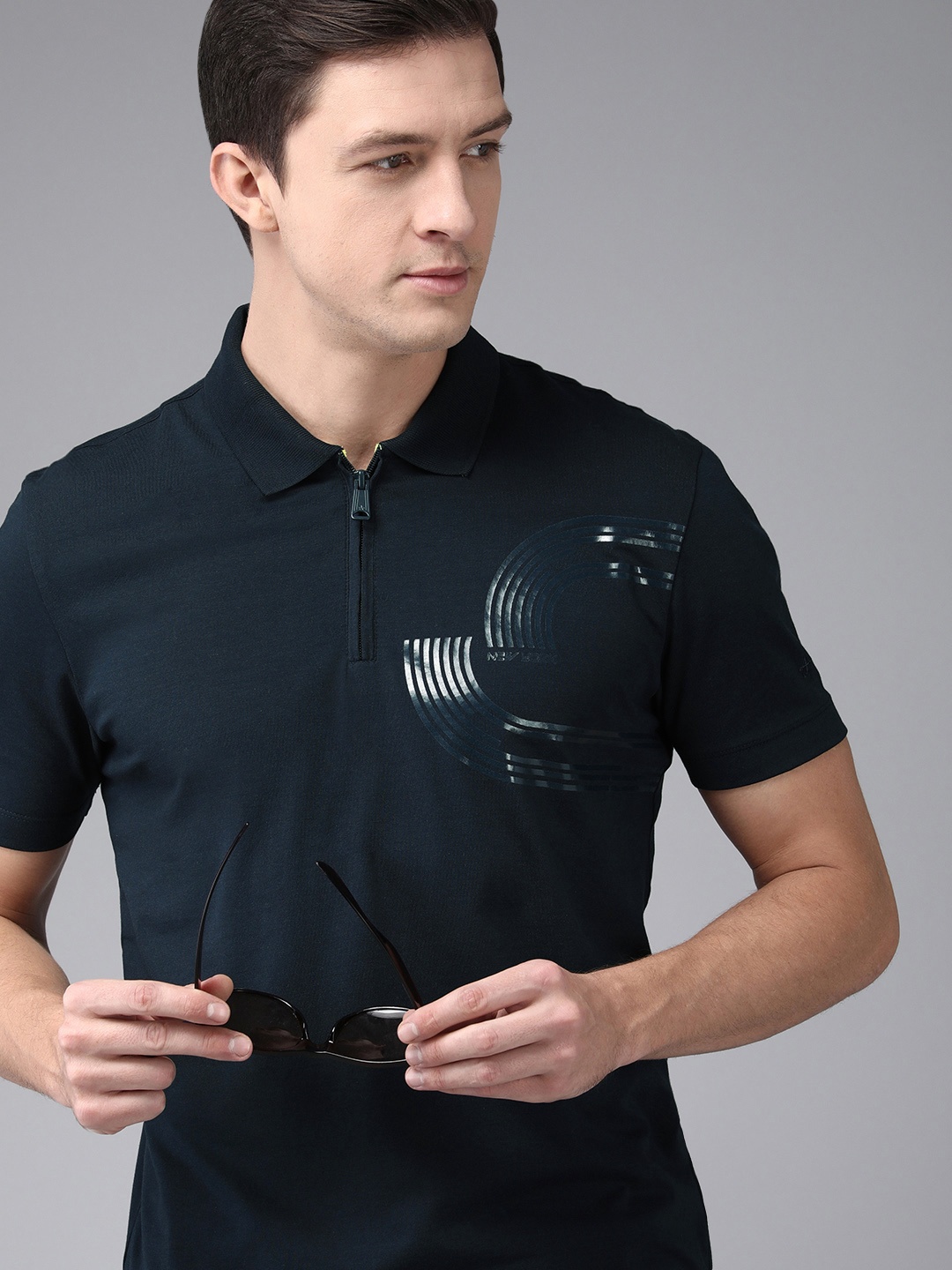 

Arrow New York Men Navy Blue Abstract Placement Print Polo Collar Regular Sleeves T-shirt