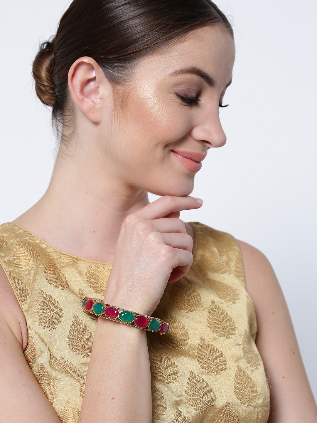 

Priyaasi Green & Red Gold Plated Ruby and Emerald Studded Kada Bracelet