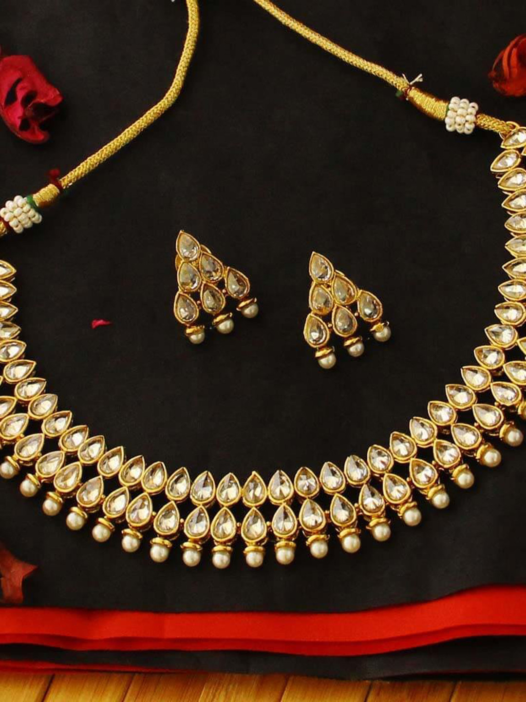 

Priyaasi Gold-Plated White Kundan & Pearl-Studded Handcrafted Jewellery Set