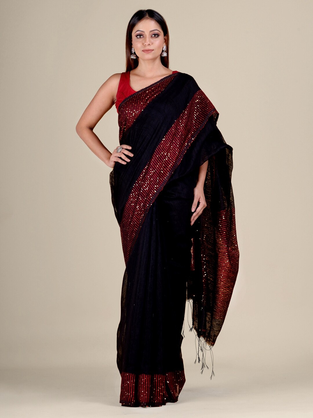 

Mitera Women Black & Maroon Jamdani Sequined Silk Blend Saree
