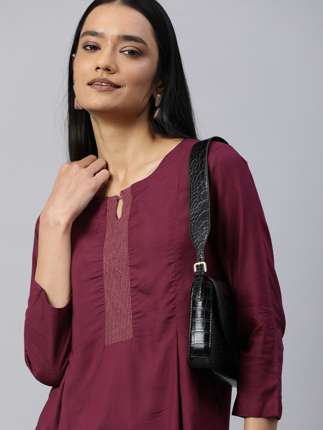 

Global Desi Women Maroon Keyhole Neck Regular Top