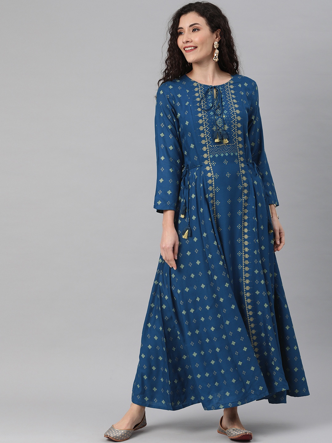 

Global Desi Women Teal & Gold Ethnic Motifs Printed Panelled Anarkali Kurta with Tie-Ups