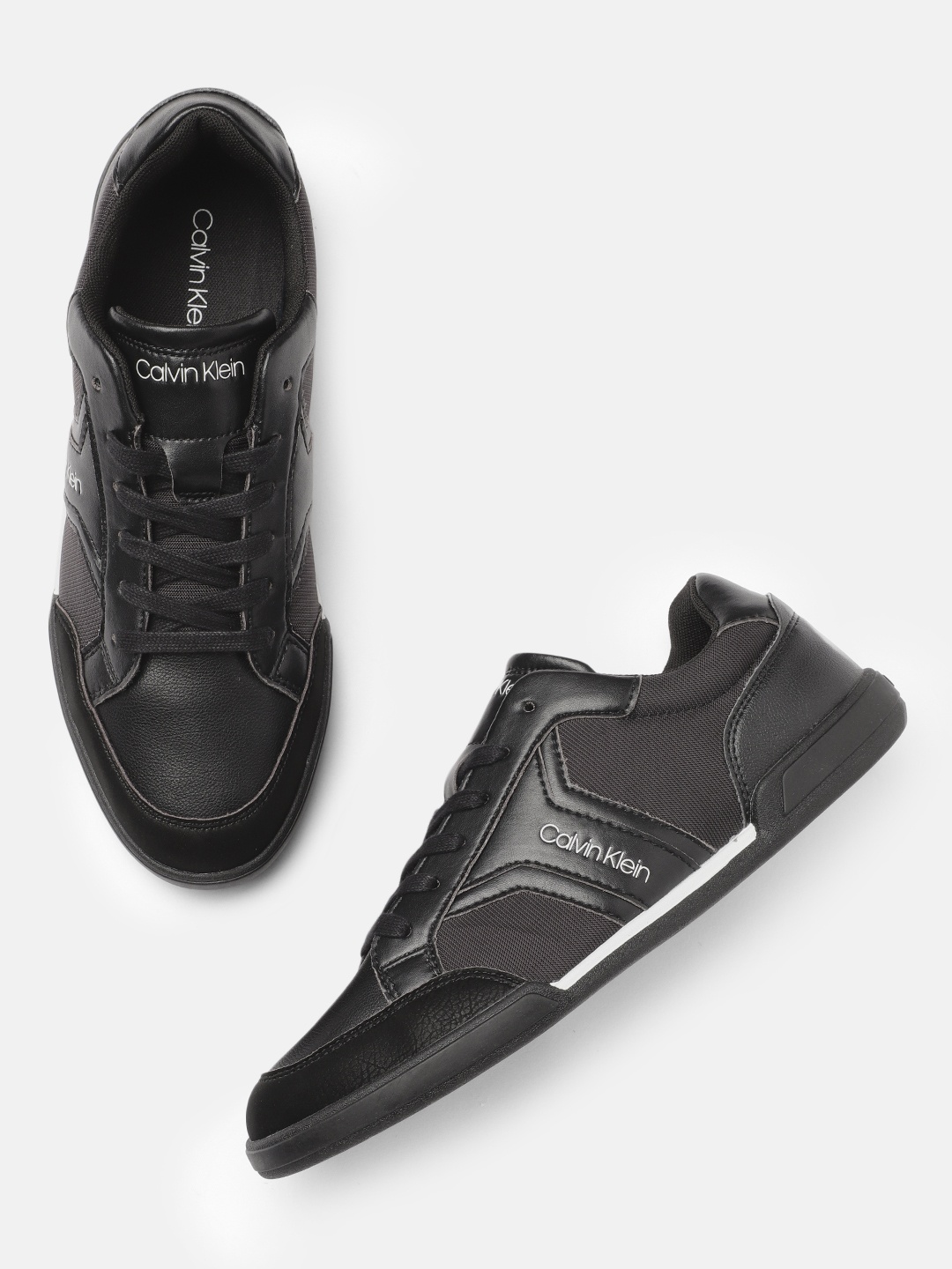 

Calvin Klein Men Black Solid LOW TOP MIX Sneakers