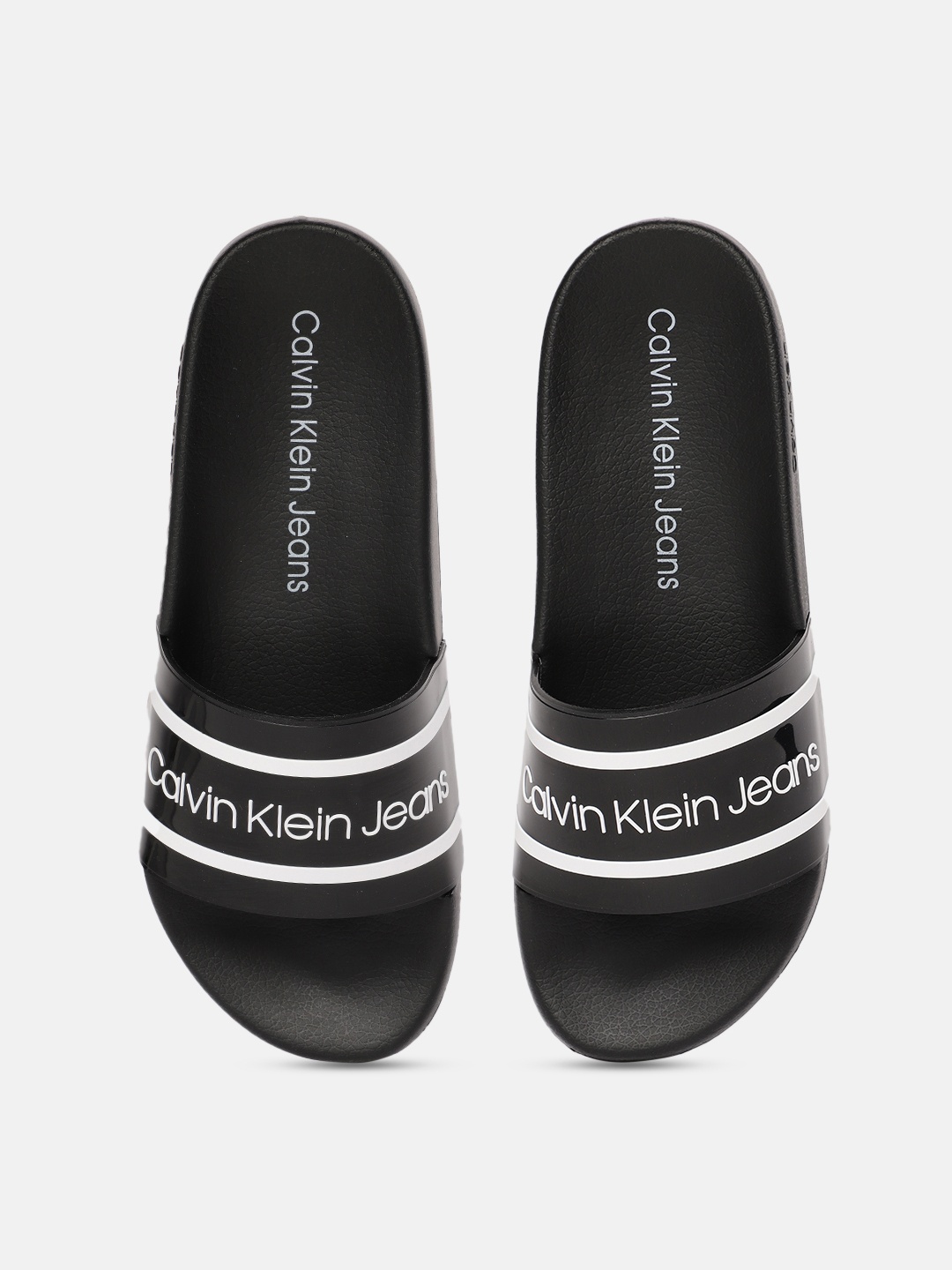 

Calvin Klein Men Black & White Striped Sliders