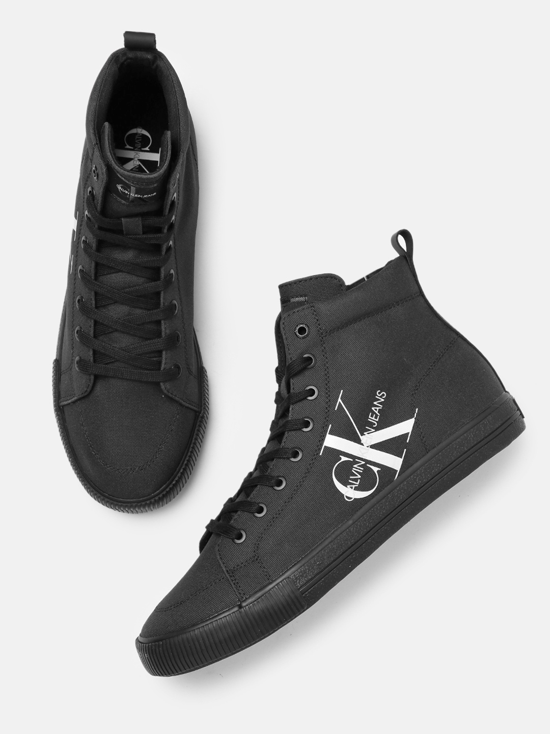 

Calvin Klein Men Black Vulcanized Mid-Top Sneakers