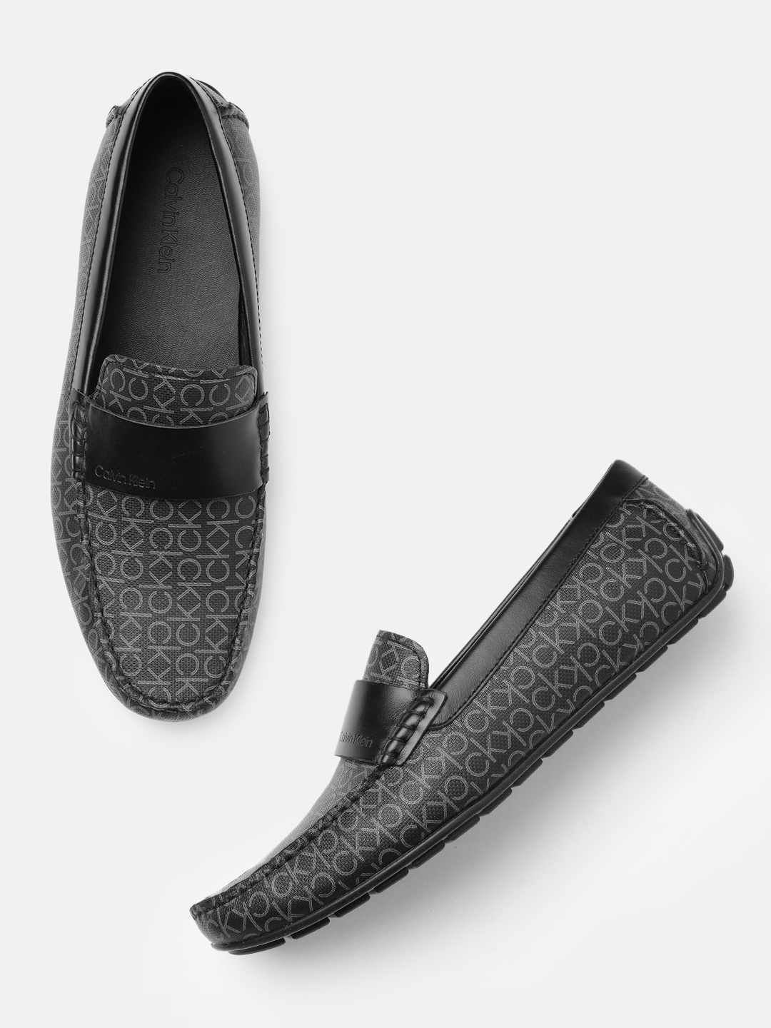 

Calvin Klein Men Black Printed Driving Shoes