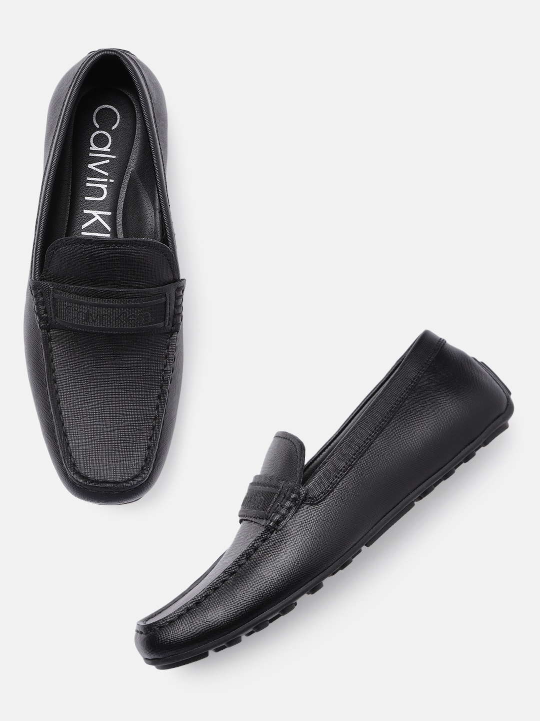 

Calvin Klein Men Black Solid Driving Shoes