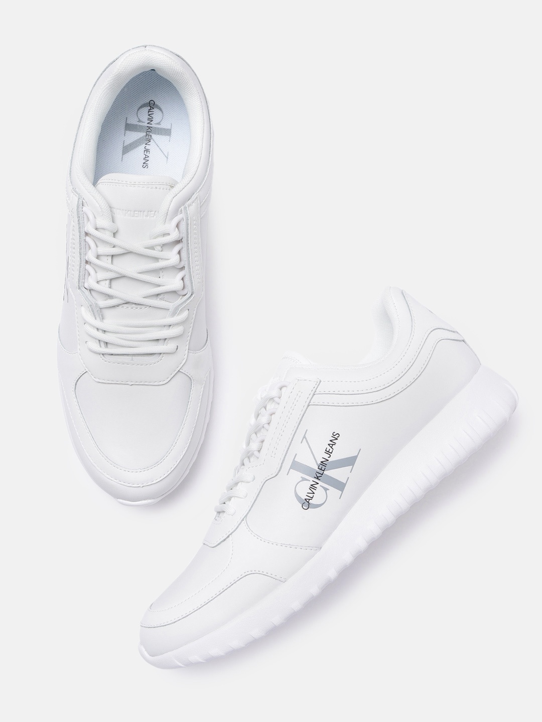 

Calvin Klein Men White Solid Leather Runner EVA LTH Regular Sneakers