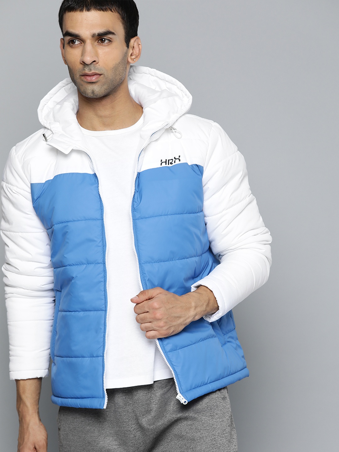 

HRX by Hrithik Roshan Men Blue & White Colourblocked Hooded Outdoor Sporty Jacket