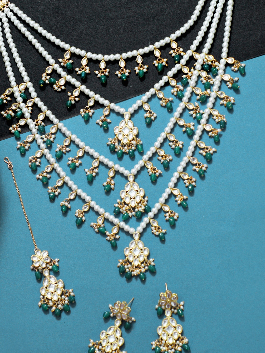 

KARATCART Gold-Plated White Kundan-Studded & Green & Beaded Handcrafted Jewellery Set