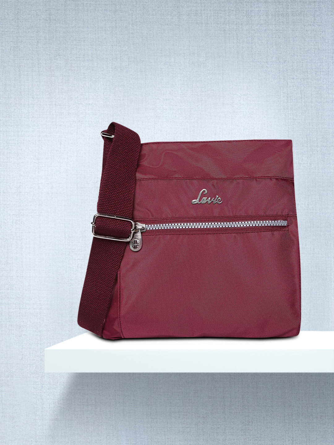 

Lavie Emi Women Burgundy Solid Structured Crossbody Sling Bag