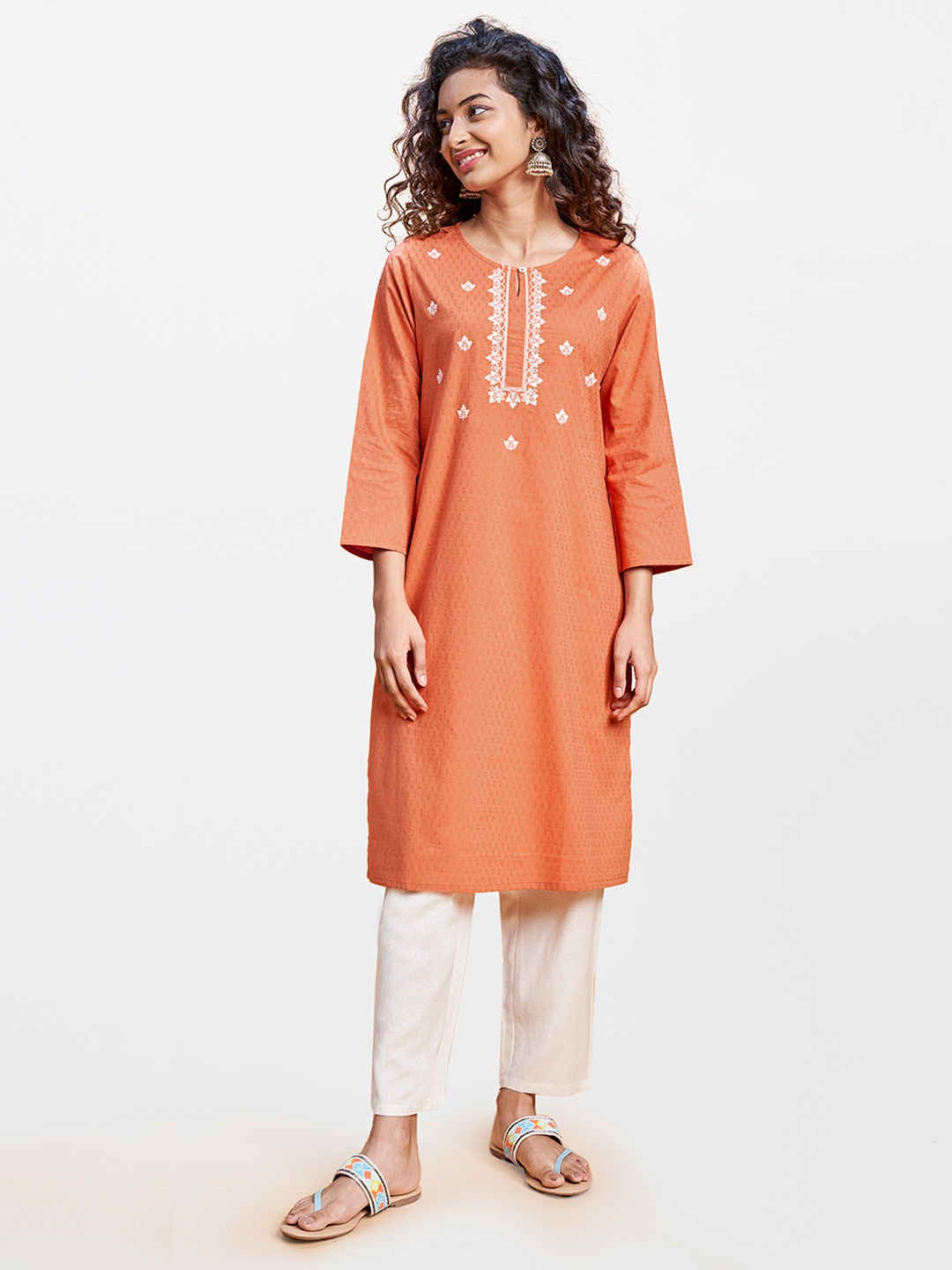

Global Desi Women Orange & Beige Embroidered Kurta Set