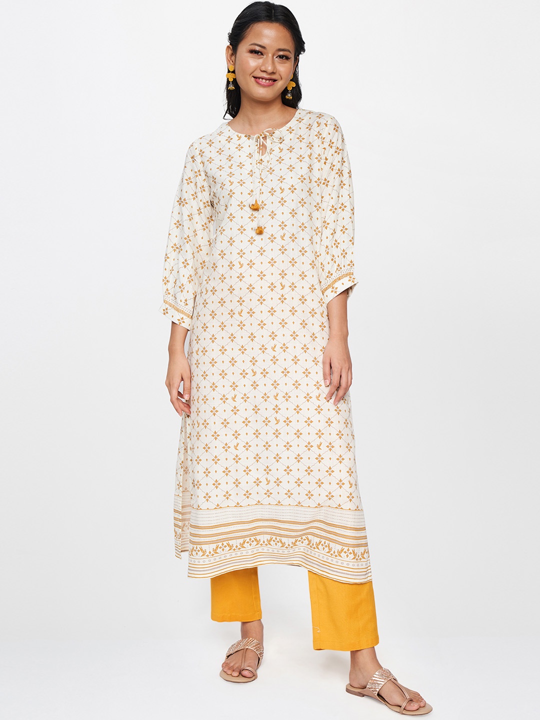 

Global Desi Women Off White & Yellow Floral Tie-up Neck Printed Kurta