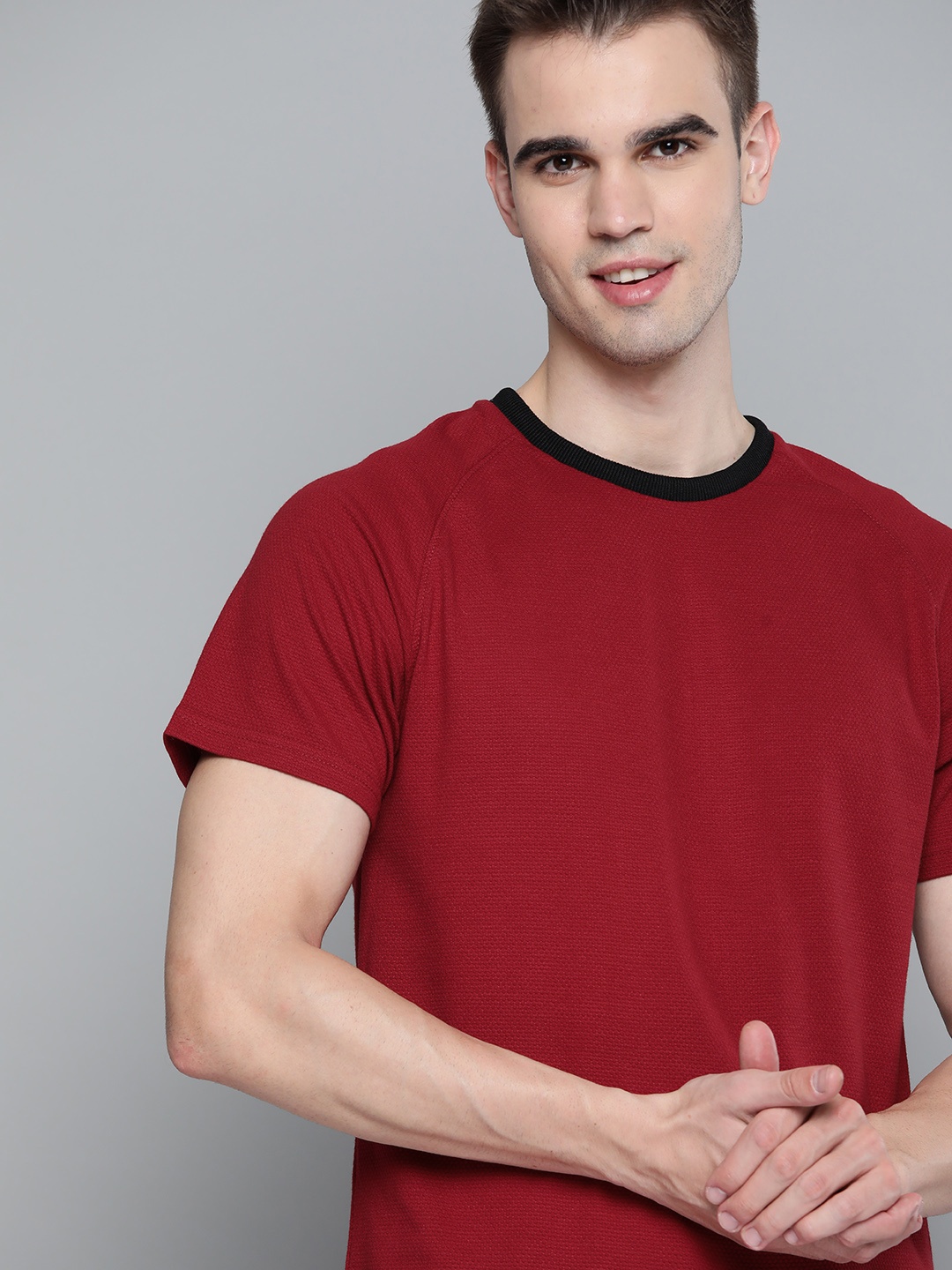 

Mast & Harbour Men Maroon Self Design T-shirt