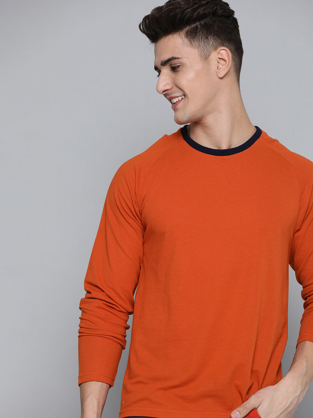 

Mast & Harbour Men Orange Self Design Wardrobe Essentials T-shirt