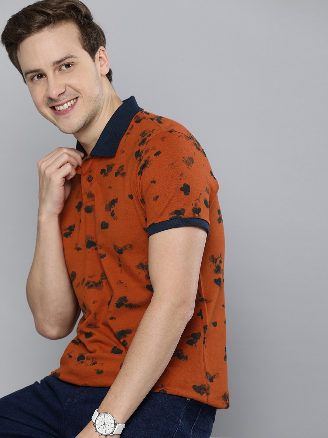 

Mast & Harbour Men Rust Orange & Black Printed Polo Collar Pure Cotton T-shirt