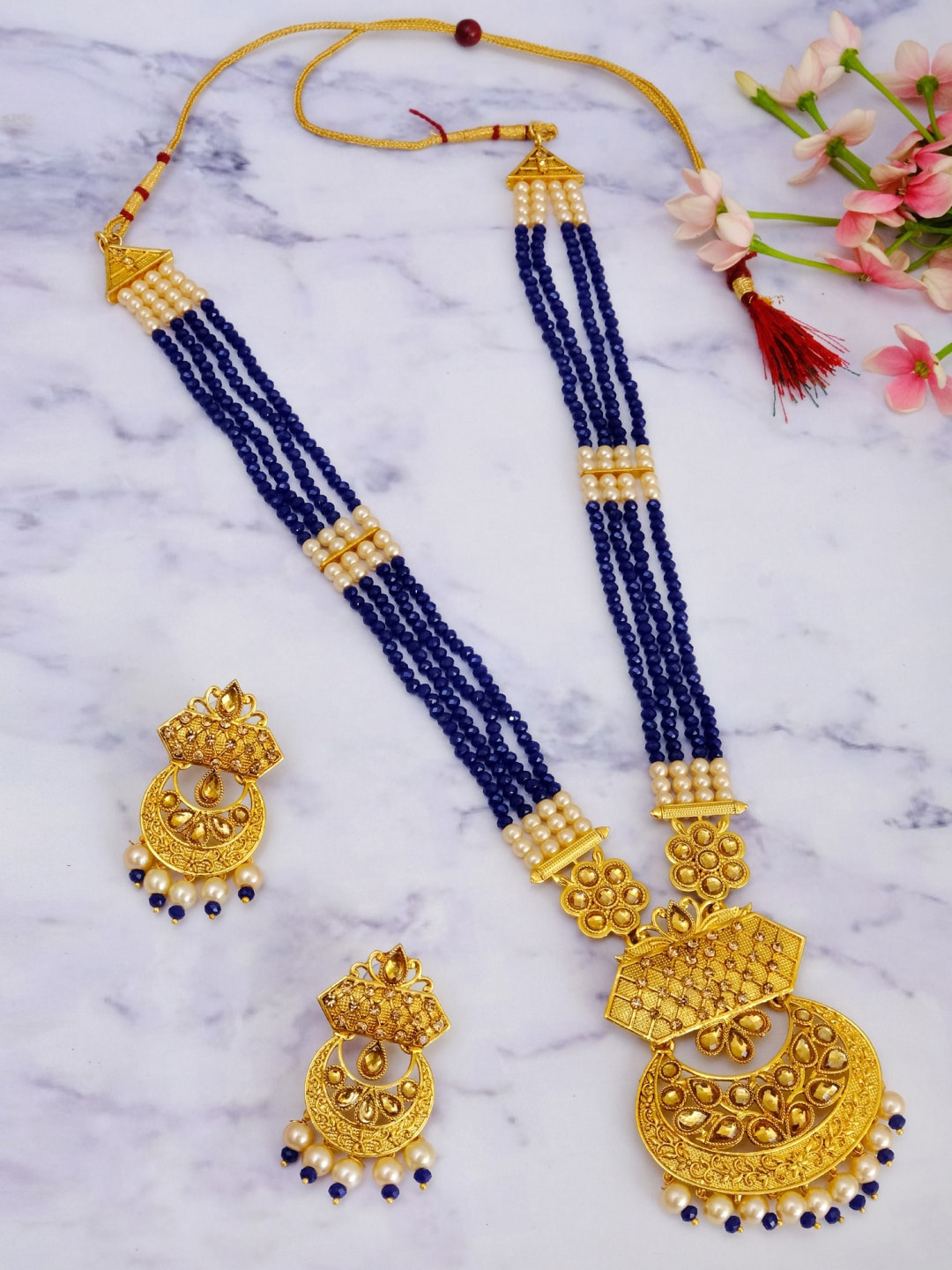

Crunchy Fashion Gold-Plated Blue & White Stone-Studded & Pearl Beaded Meenakari Jewellery Set