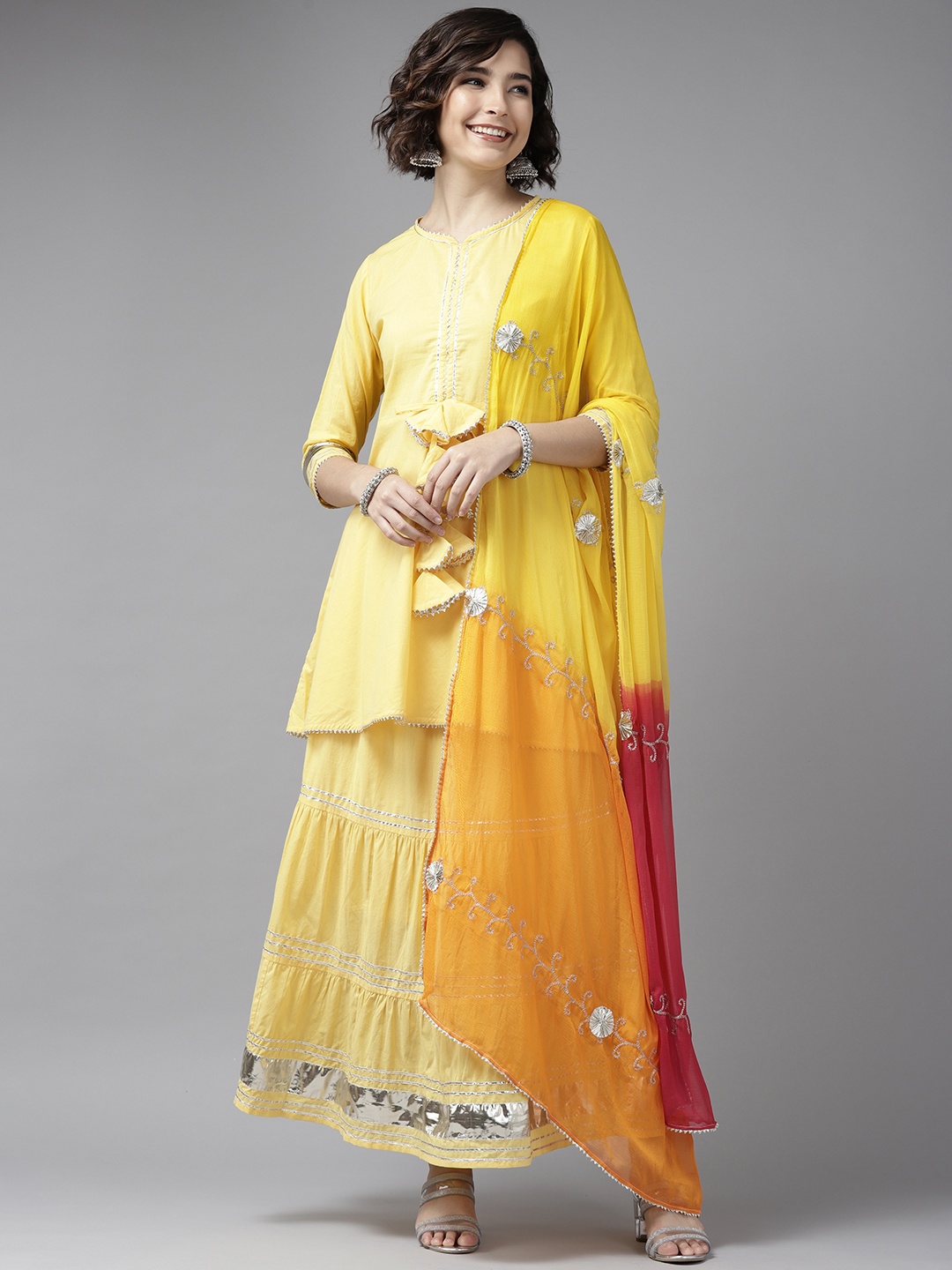 

Indo Era Women Yellow Regular Gotta Patti Pure Cotton Kurti with Skirt & With Dupatta