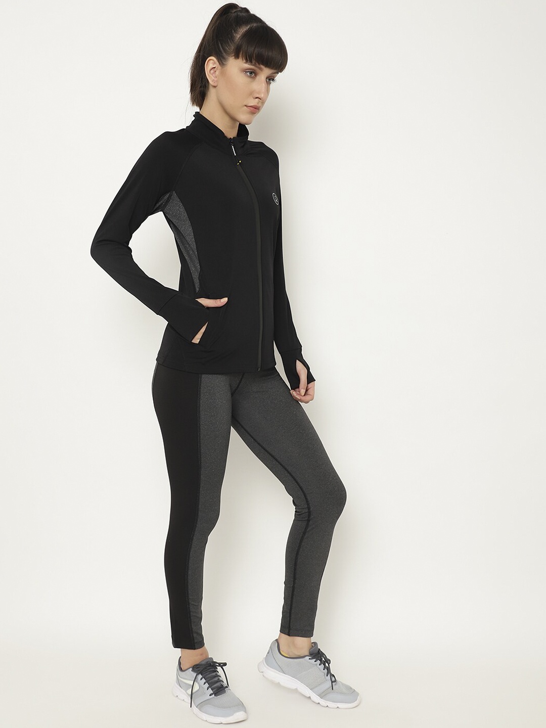 

Chkokko Women Black & Grey Solid Tracksuit